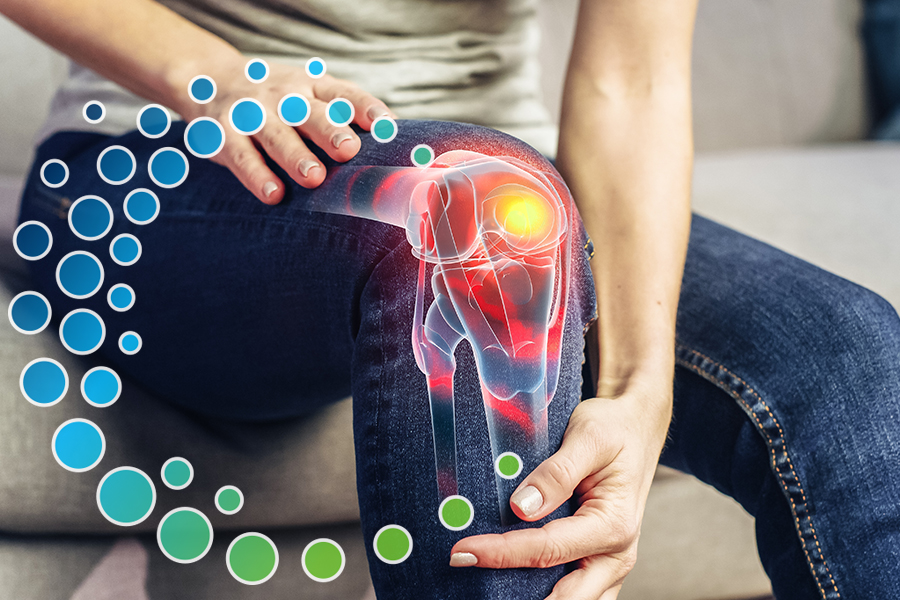 Woman sitting on a couch with her hands placed above her knee and on her shin showing a graphic knee with a pain point representing knee pain that can be treated at Absolute Integrated Health Center.